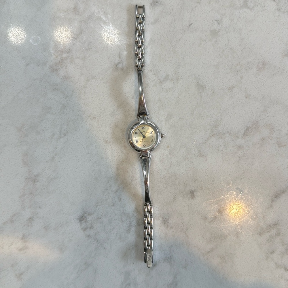 Anne Klein Watch
Silver with white quartz face